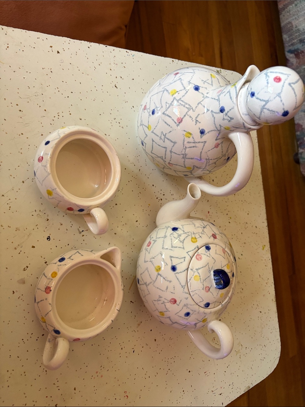 Hand-Painted White Ceramic Tea Set with Colorful Dot Accents